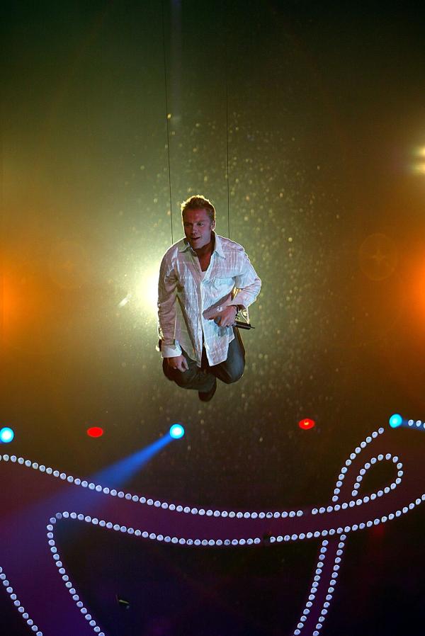 6/12/02.    Ronan Keating doing his peter pan impression at the Capital FM Christmas Live at Earls Court