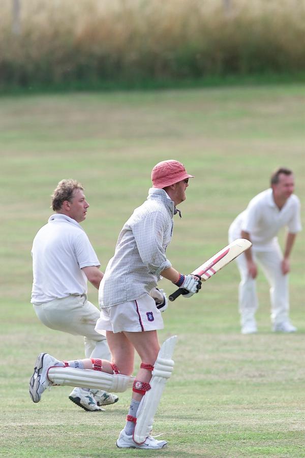 FROM Paul Burgman 27/07/01. Chris Evans who carried his bat for the team in his second innings for Hascombe Vilage's Cricket team