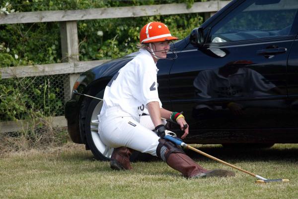 12/06/04 Jodie Kidd limbers up before Polo