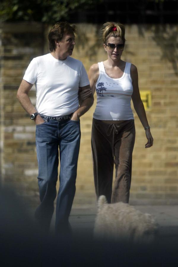 09/07/03  Paul McCartney and Pregnant Heather Mills take a walk near their London home today