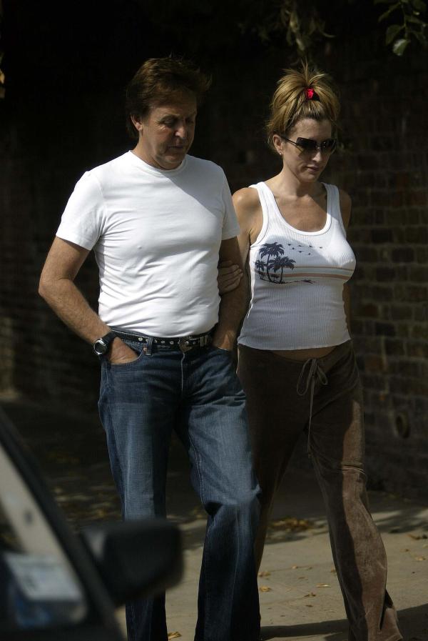 09/07/03  Paul McCartney and Pregnant Heather Mills take a walk near their London home today