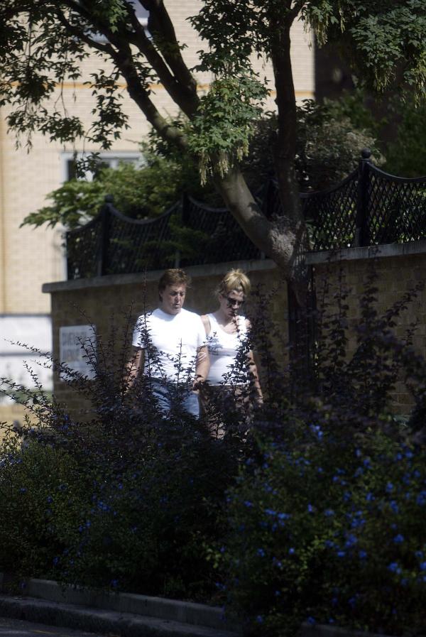 09/07/03  Paul McCartney and Pregnant Heather Mills take a walk near their London home today