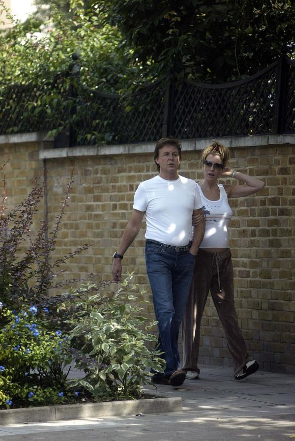 09/07/03  Paul McCartney and Pregnant Heather Mills take a walk near their London home today