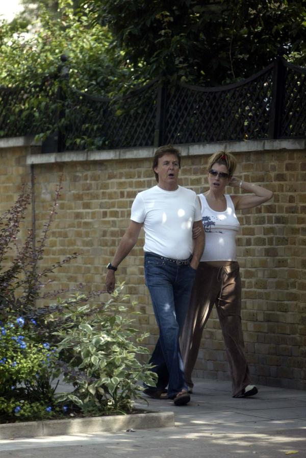 09/07/03  Paul McCartney and Pregnant Heather Mills take a walk near their London home today