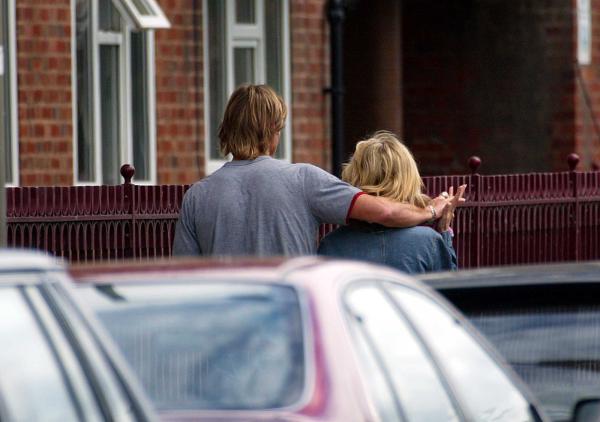 18/05/02.    Ian and Sally Meen this afternoon leaving his  marital home this afternoon