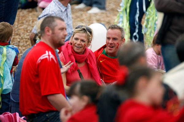 6th May 2006 Zoe Ball and Norman Coook with child at the Brighton Arts Festival on Brightonn Beach.