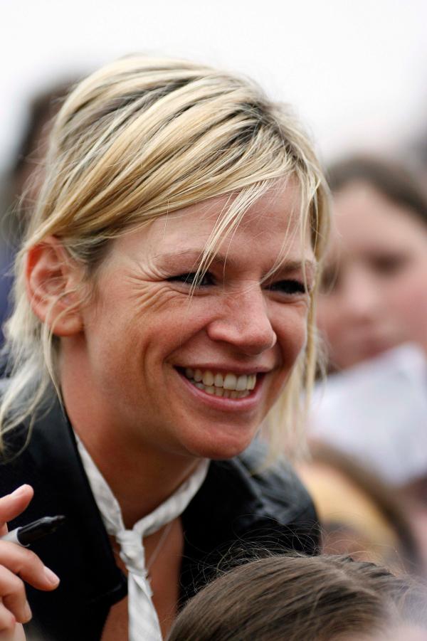 6th May 2006 Zoe Ball and Norman Coook with child at the Brighton Arts Festival on Brightonn Beach.