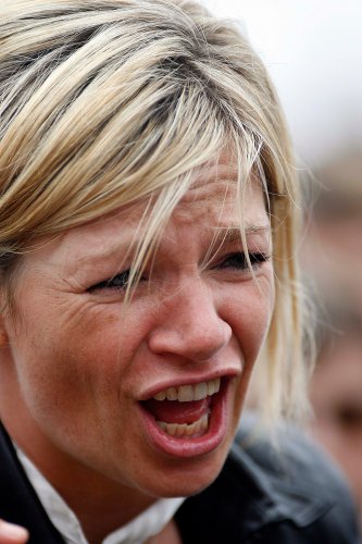 6th May 2006 Zoe Ball and Norman Coook with child at the Brighton Arts Festival on Brightonn Beach.