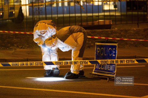 2/02/2015 Police and Forensics on the scene at the Junction of Aldershot Road & Worplesdon Road, GU2 8AF