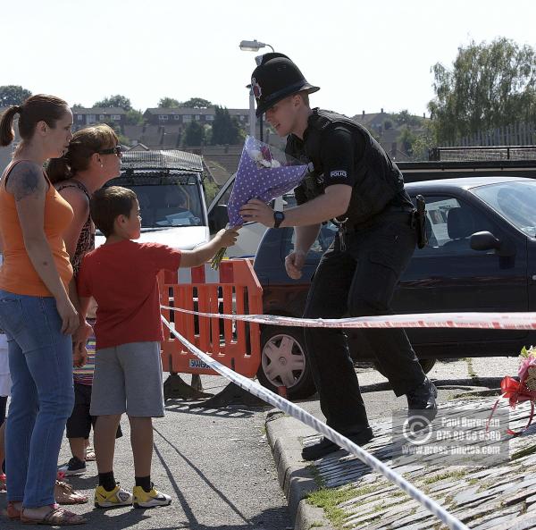 11/08/2012 Tributes arrive at Tia Sharp's grandparents house, in The Lindens, New Addington, Croydon