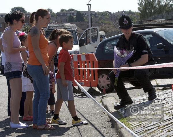 11/08/2012 Tributes arrive at Tia Sharp's grandparents house, in The Lindens, New Addington, Croydon