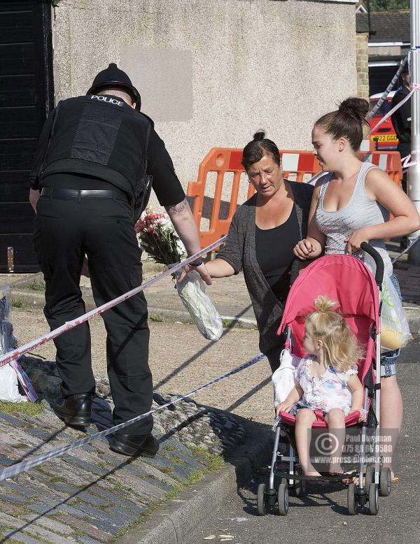 11/08/2012 Tributes arrive at Tia Sharp's grandparents house, in The Lindens, New Addington, Croydon