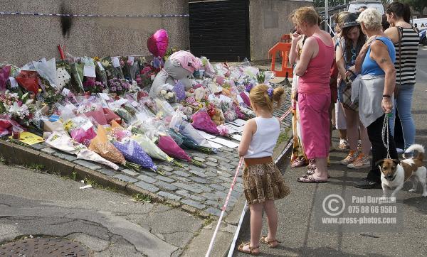 11/08/2012 Tributes arrive at Tia Sharp's grandparents house, in The Lindens, New Addington, Croydon