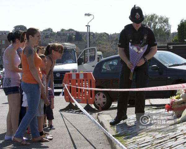 11/08/2012 Tributes arrive at Tia Sharp's grandparents house, in The Lindens, New Addington, Croydon