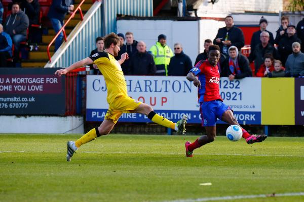 26/12/2016.  Aldershot Town v Woking FC.  MENSAH crosses