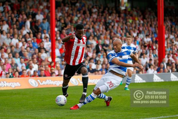 21/04/2018. Brentford v Queens Park Rangers SkyBet Championship Action from Griffin Park.  Brentford's Florian JOZEFZOON & QPR’s Alex JOHN-BAPTISTE