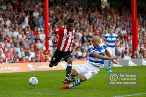 21/04/2018. Brentford v Queens Park Rangers SkyBet Championship Action from Griffin Park.  Brentford's Florian JOZEFZOON & QPR’s Alex JOHN-BAPTISTE