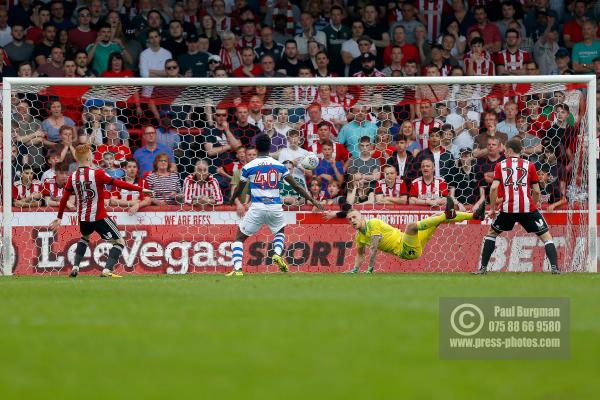 21/04/2018. Brentford v Queens Park Rangers SkyBet Championship Action from Griffin Park.  Brentford's Goalkeeper Daniel BENTLEY parries ball to QPR’s Idrissa SYLLA who scores