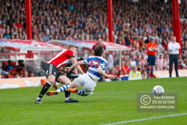 21/04/2018. Brentford v Queens Park Rangers SkyBet Championship Action from Griffin Park.  Brentford's Lewis MACLEOD & QPR’s Paul SMYTH