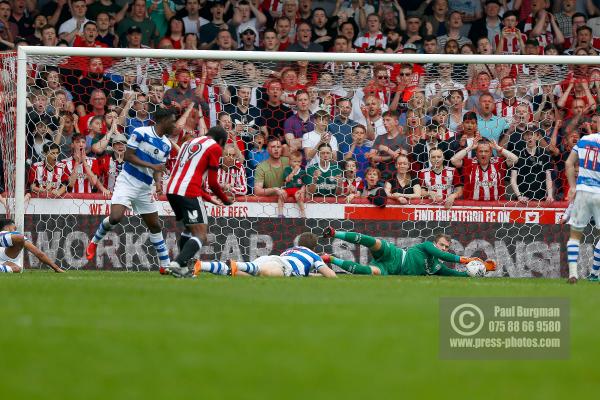 21/04/2018. Brentford v Queens Park Rangers SkyBet Championship Action from Griffin Park. Brentford's Romaine SAWYERS shoots & QPR’s Goalkeeper Alex SMITHIES saves