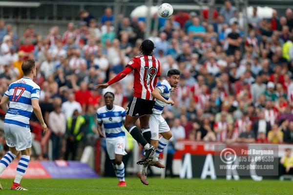 21/04/2018. Brentford v Queens Park Rangers SkyBet Championship Action from Griffin Park.  QPR’s Massimo LUONGO & Brentford's Romaine SAWYERS