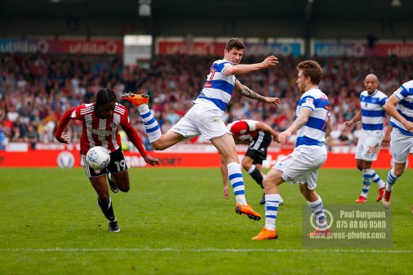 21/04/2018. Brentford v Queens Park Rangers SkyBet Championship Action from Griffin Park.  QPR’s Jamie MACKIE & Brentford's Romaine SAWYERS