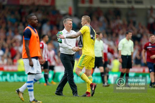 21/04/2018. Brentford v Queens Park Rangers SkyBet Championship Action from Griffin Park.  Brentford's Manager Dean SMITH congrats Brentford's Goalkeeper Daniel BENTLEY