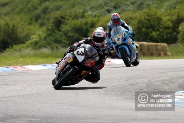 06/06/04  Michael Rutter   (no 3) HM Plant Honda. Action from the British Super Bikes THRUXTON today